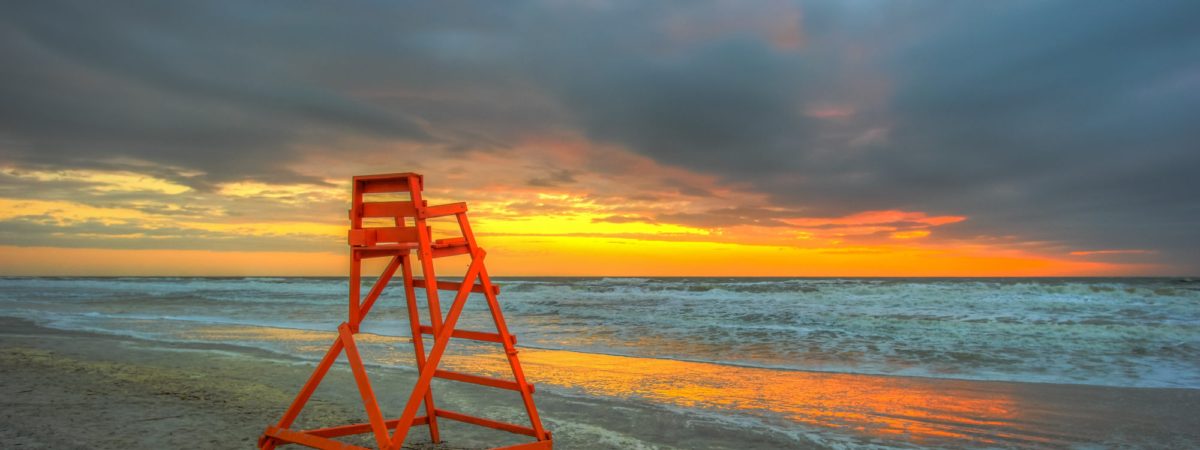 Sunrise over the lifeguard stand at Atlantic Beach